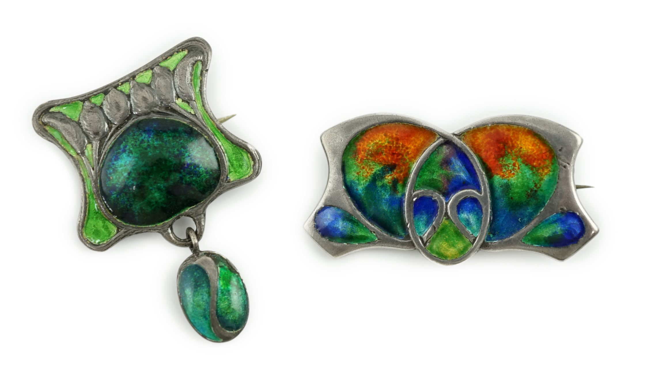 An Edwardian Art Nouveau silver and green enamel set drop brooch and a similar brooch with polychrome enamel, both by Liberty & Co Ltd